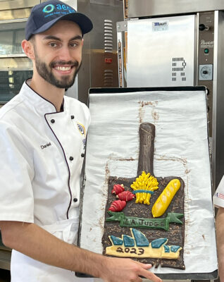 Daniel with his bread plaque